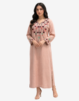 Luxury blush pink linen jalabiya with hand embroidery on the neckline and cuffs by Gharza Couture