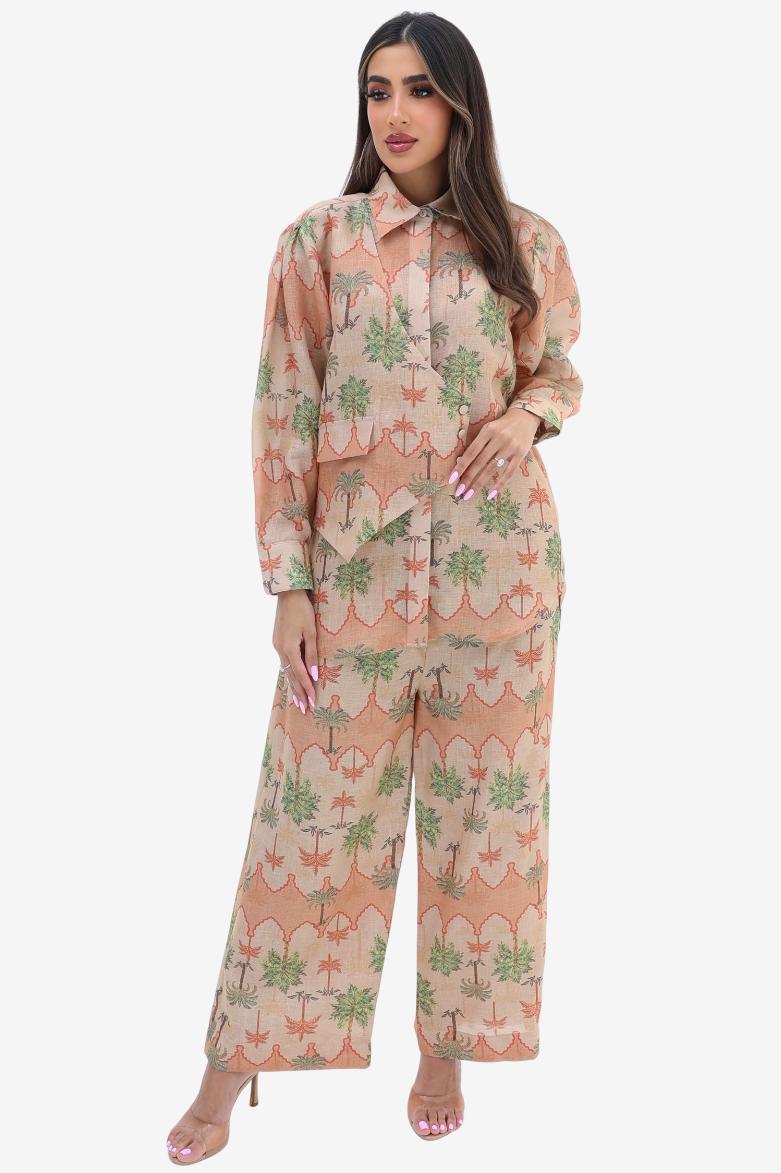 Front view of the Desert Palm Linen Blend Co-Ord Set by Gharza Couture featuring a button-down shirt, wide-leg trousers and palm print.