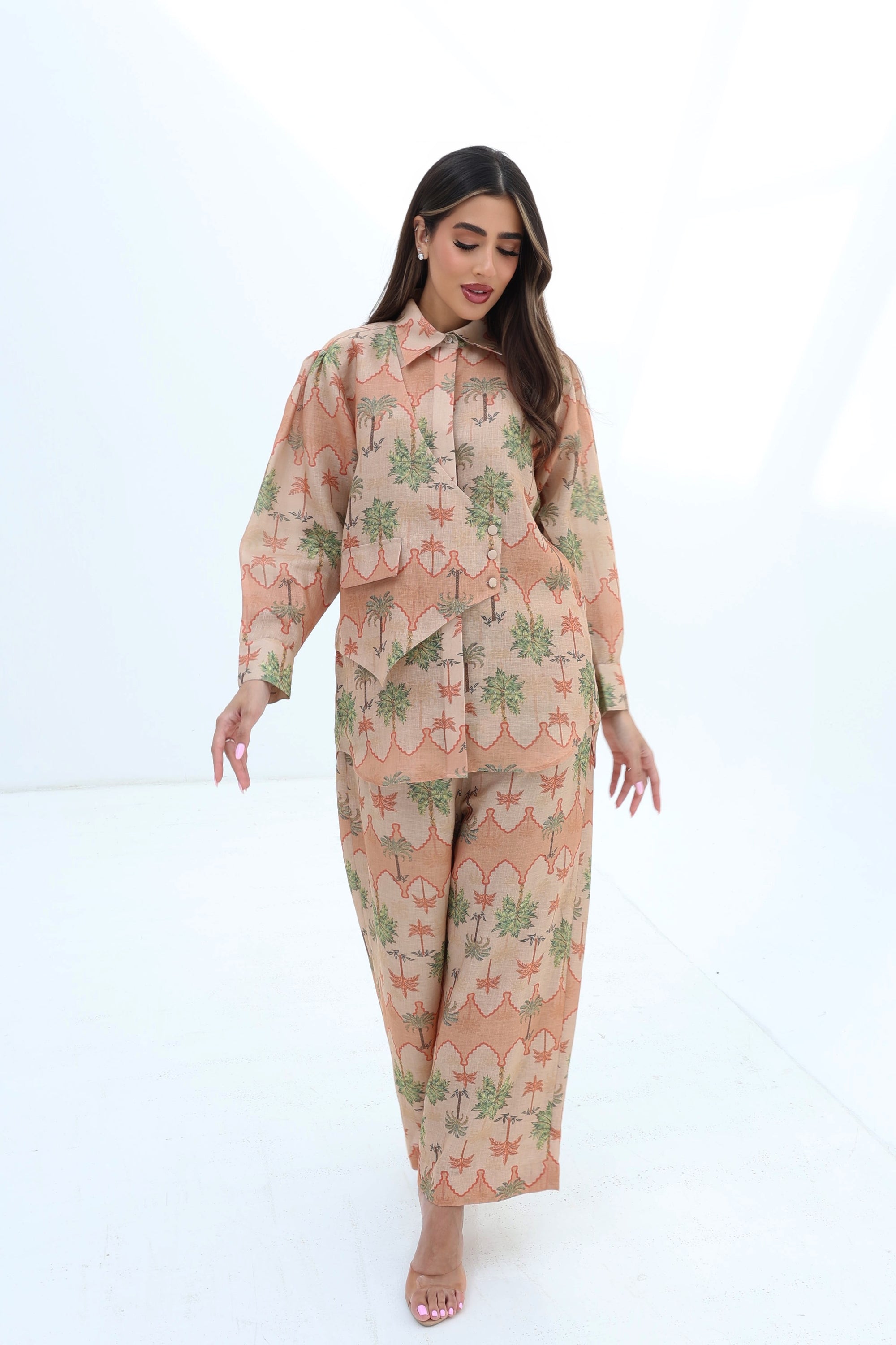 Walking view of the Desert Palm Linen Blend Co-Ord Set featuring a relaxed fit and wide-leg trousers by Gharza Couture.