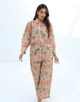 Walking view of the Desert Palm Linen Blend Co-Ord Set featuring a relaxed fit and wide-leg trousers by Gharza Couture.