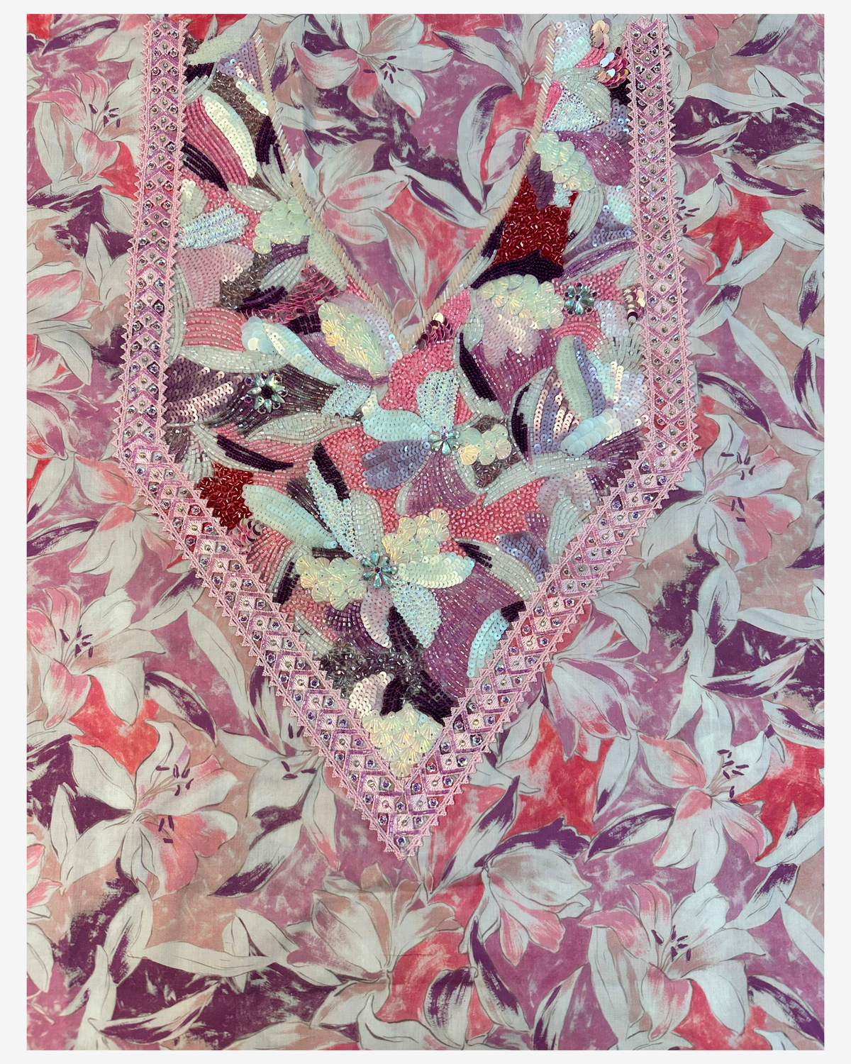 Complete pink floral Liberty mukhawar fabric with an elongated hand-beaded neckline in coral, ivory and plum.