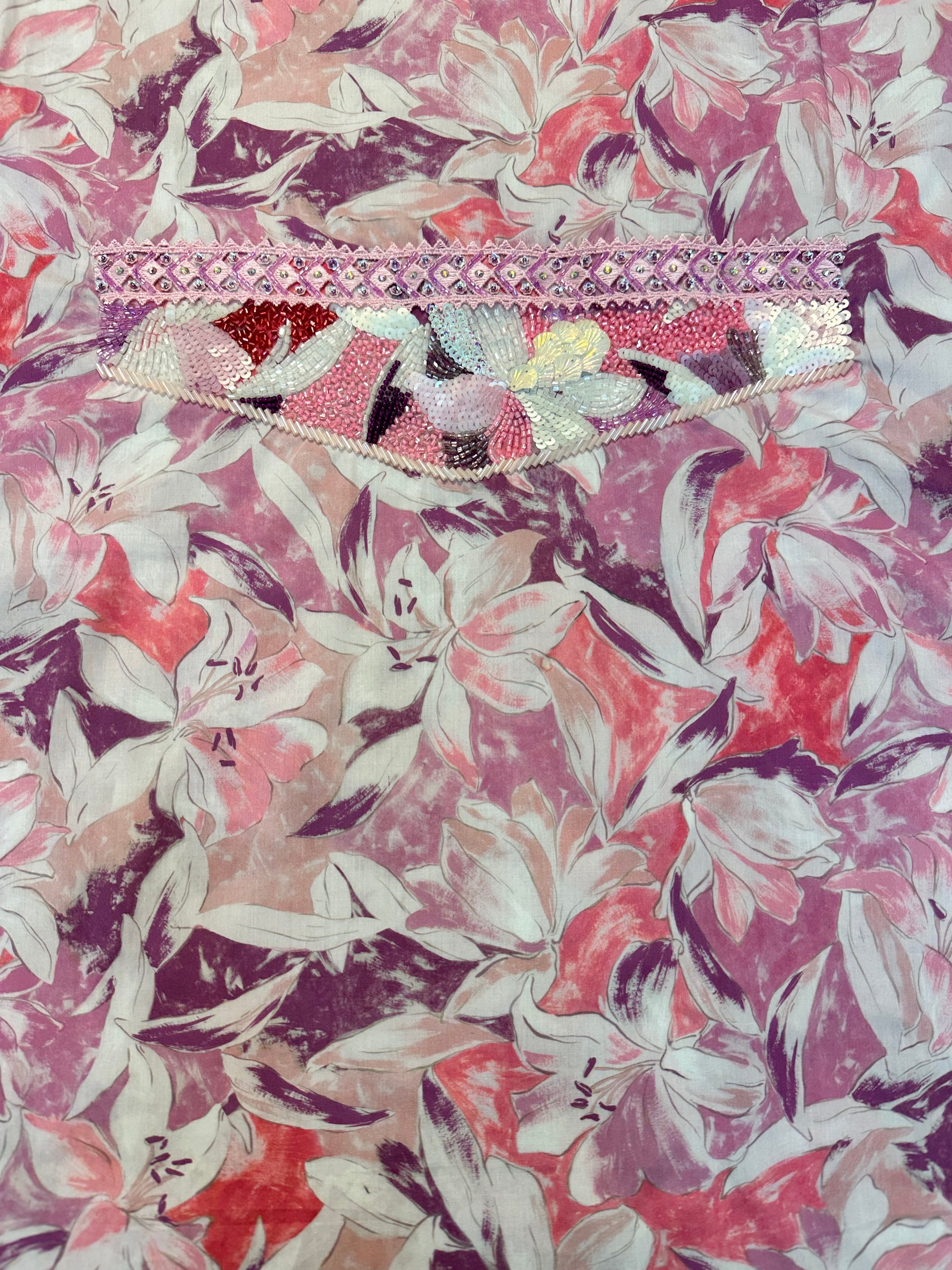 Premium Liberty cotton fabric displaying the dusty rose botanical print of the Dusty Rose Botanical Liberty Cotton Mukhawar for custom tailoring by Gharza Couture.