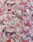 Premium Liberty cotton fabric displaying the dusty rose botanical print of the Dusty Rose Botanical Liberty Cotton Mukhawar for custom tailoring by Gharza Couture.