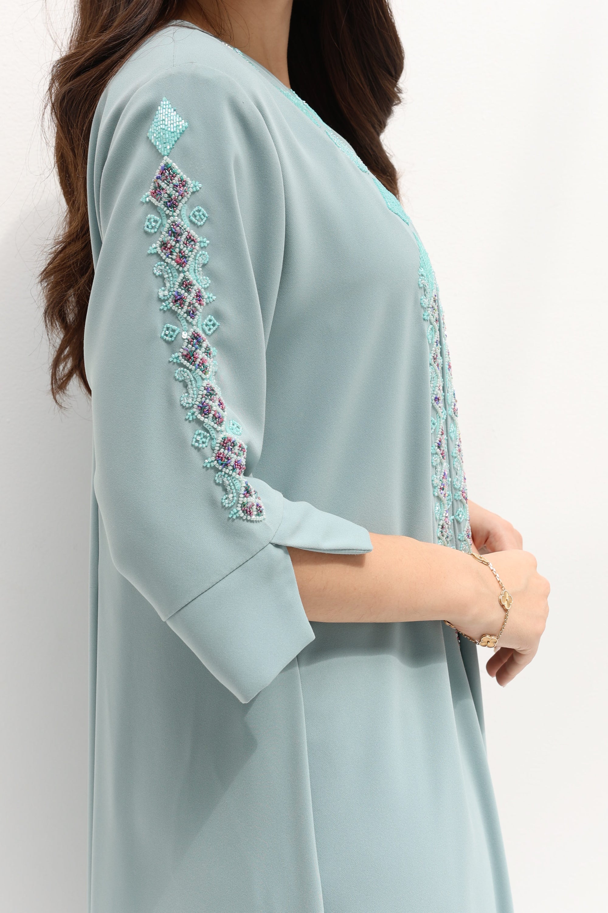 Sleeve detail of Embroidered Butter Crepe Kaftan showing the decorative floral embroidery
