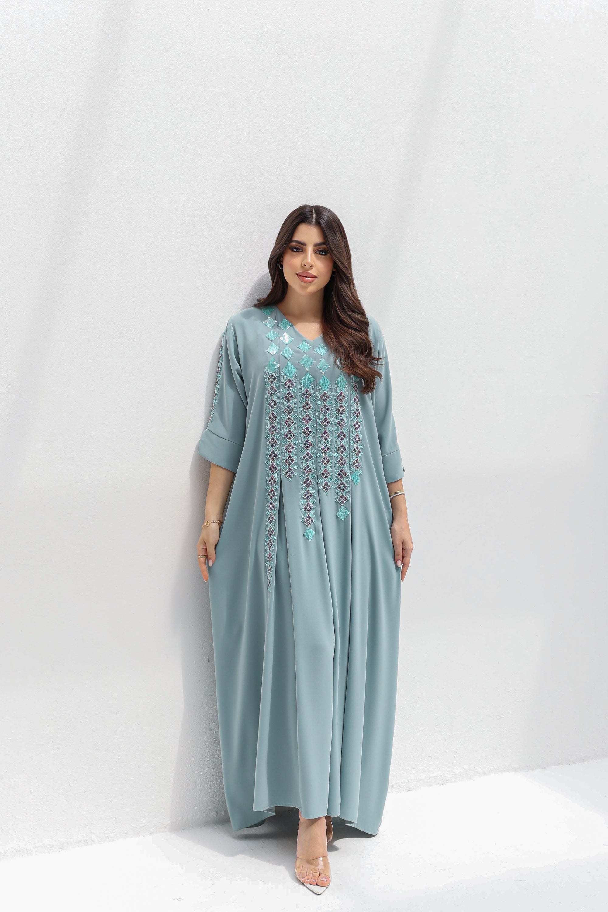 Front full-length view of embroidered kaftan featuring relaxed elbow-length sleeves
