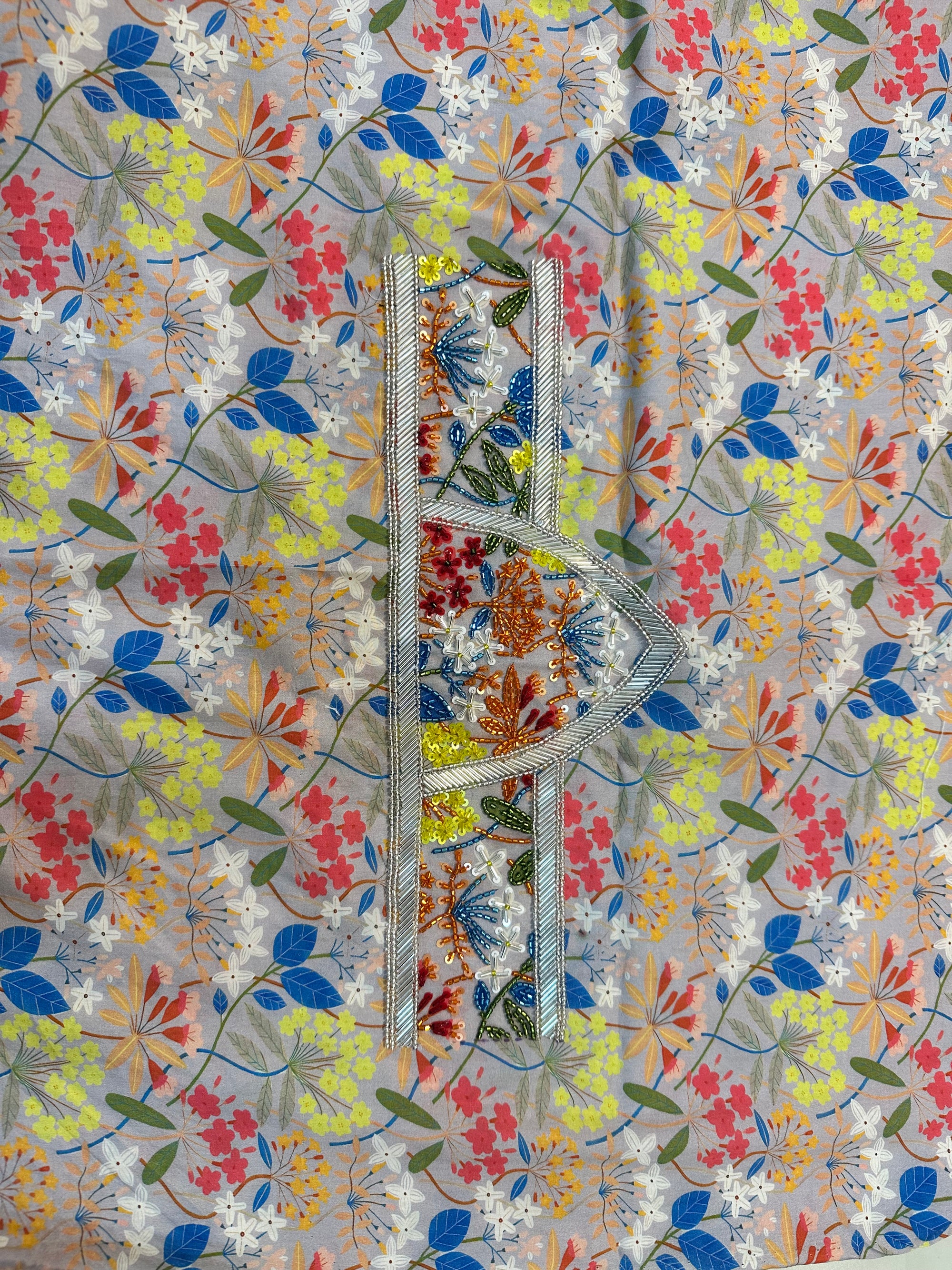 Detailed view of Floral Cotton Satin Mukhawar highlighting the colourful floral print on premium unstitched cotton satin fabric by Gharza Couture.