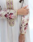 Close-up of Floral Embroidered Trim Abaya showing colourful cuff embroidery