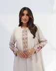 Front view of ivory Floral Embroidered Trim Abaya with flowing modest silhouette