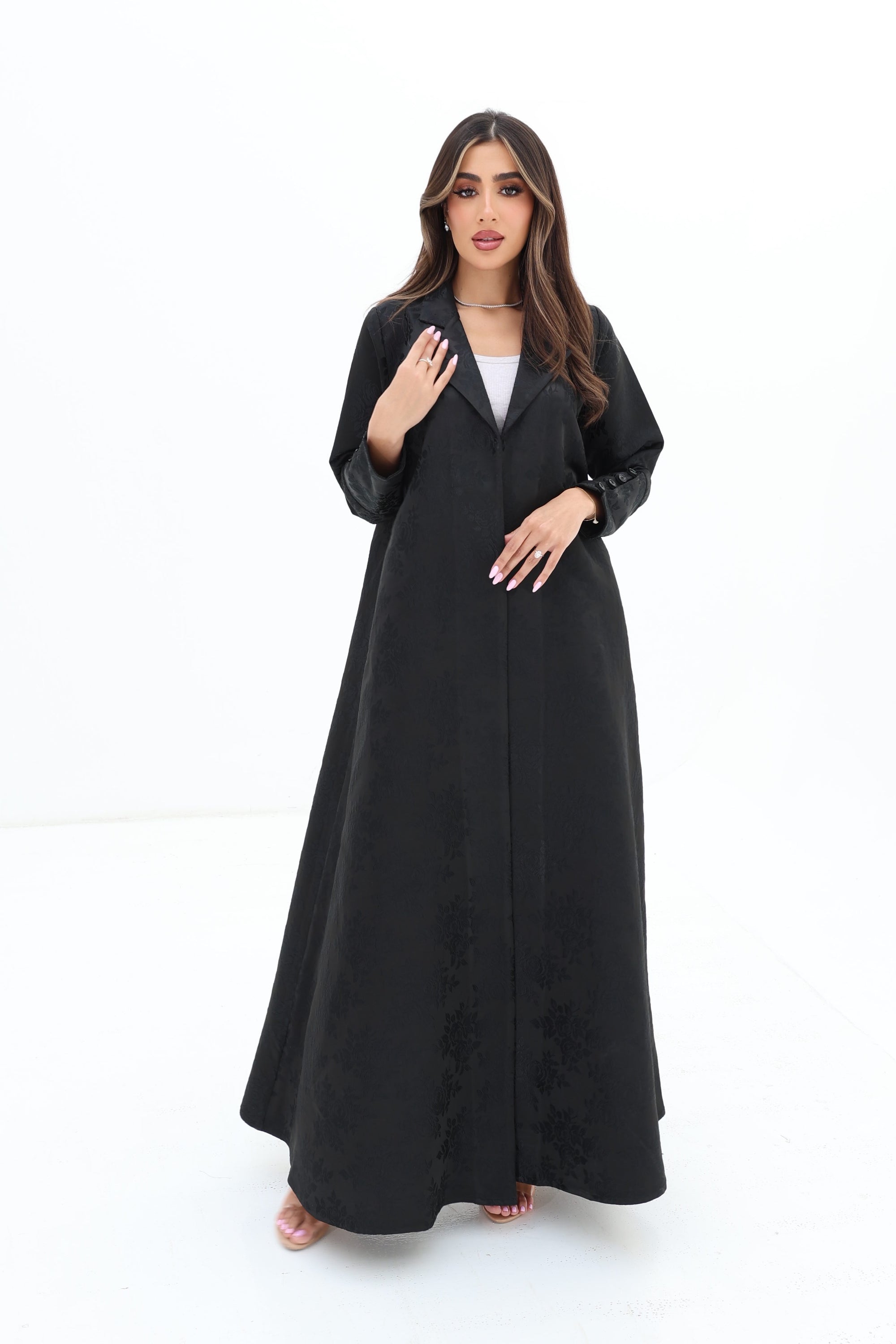 Black Floral Textured Blazer Abaya by Gharza Couture styled for modern modest fashion with a timeless tailored silhouette.