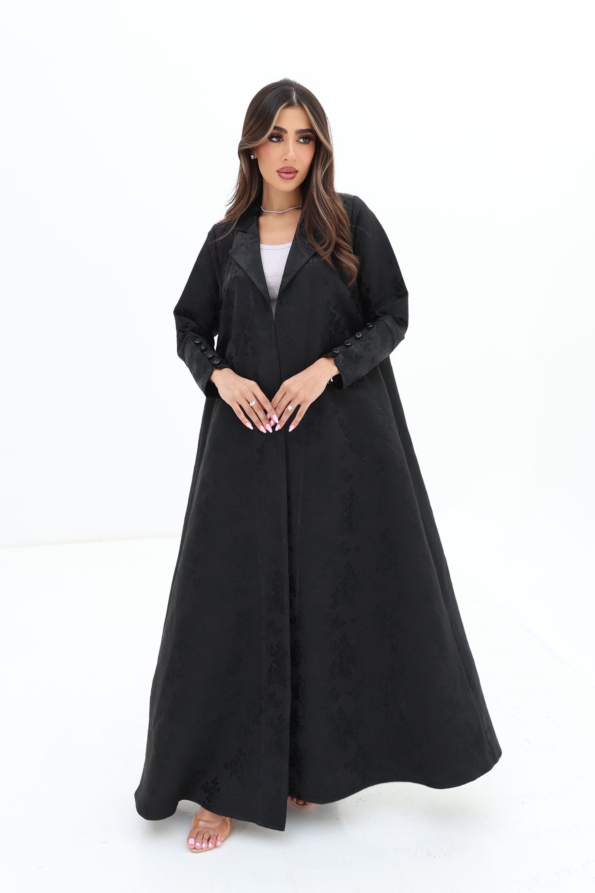 Full-length Floral Textured Blazer Abaya in black by Gharza Couture featuring a flowing modest silhouette and premium textured fabric.