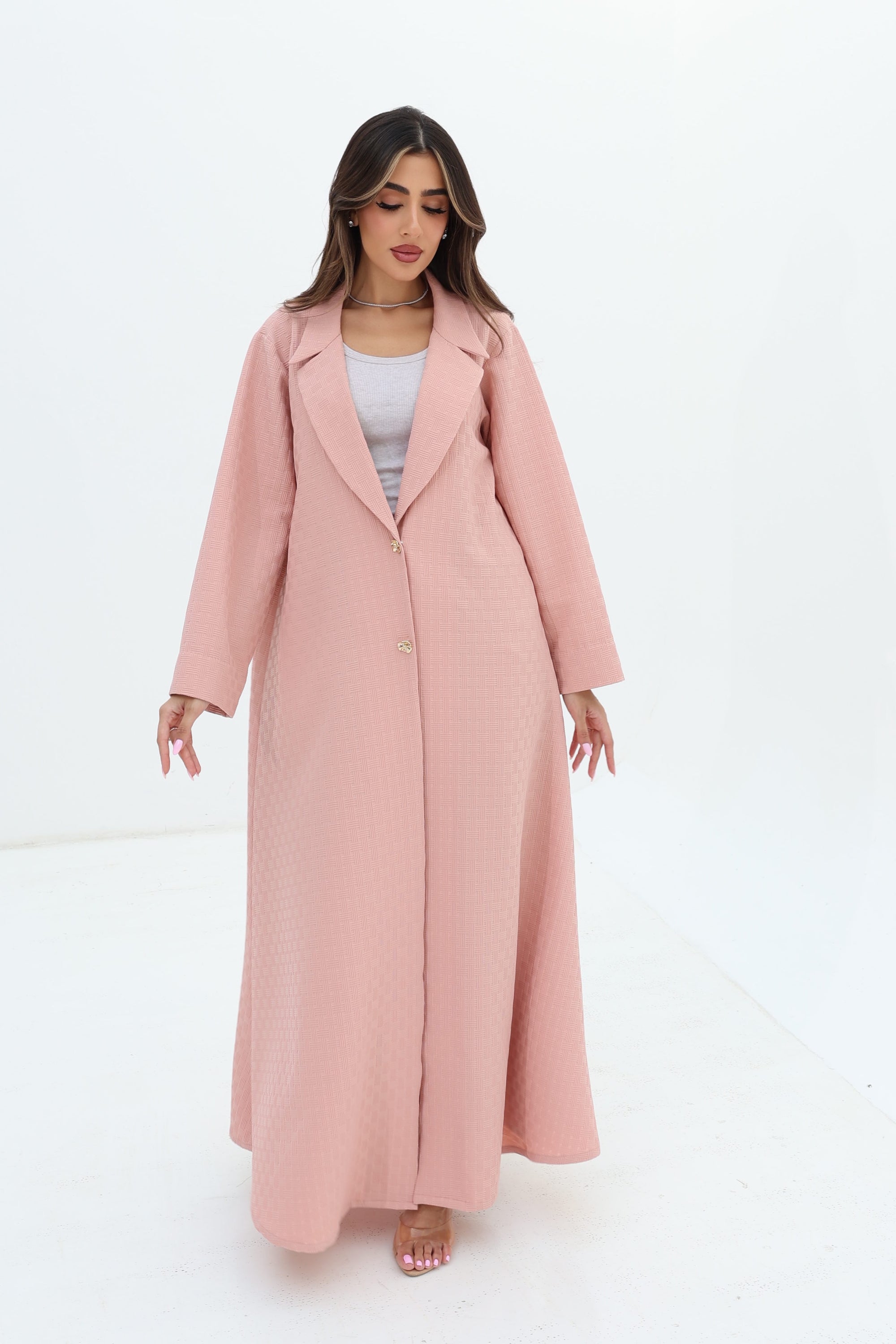 Full-length Blush Pink Blazer Textured Stretch Abaya by Gharza Couture with elegant open-front design and modest silhouette.
