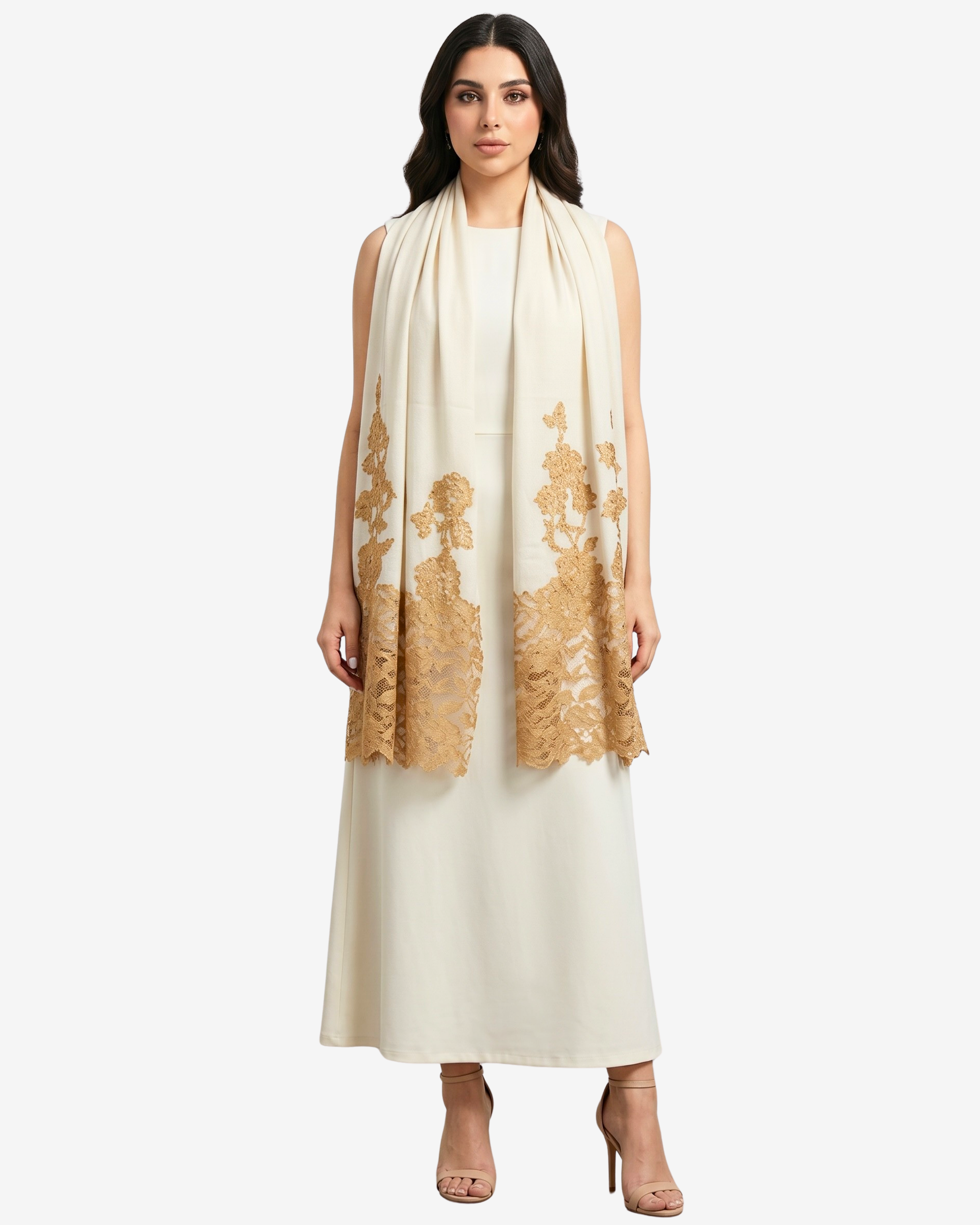 A woman modeling a long cream maxi dress with a matching draped scarf featuring gold floral lace embroidery, set against a plain light gray background.