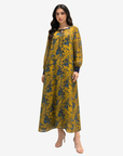 Full-length Golden Meadow Cotton Chiffon Dress featuring a soft cotton lining, lightweight chiffon overlay, and graceful floral design.