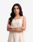 Close-up of the Ivory Grace Crepe Satin Maxi Dress featuring a refined square neckline and smooth satin finish.
