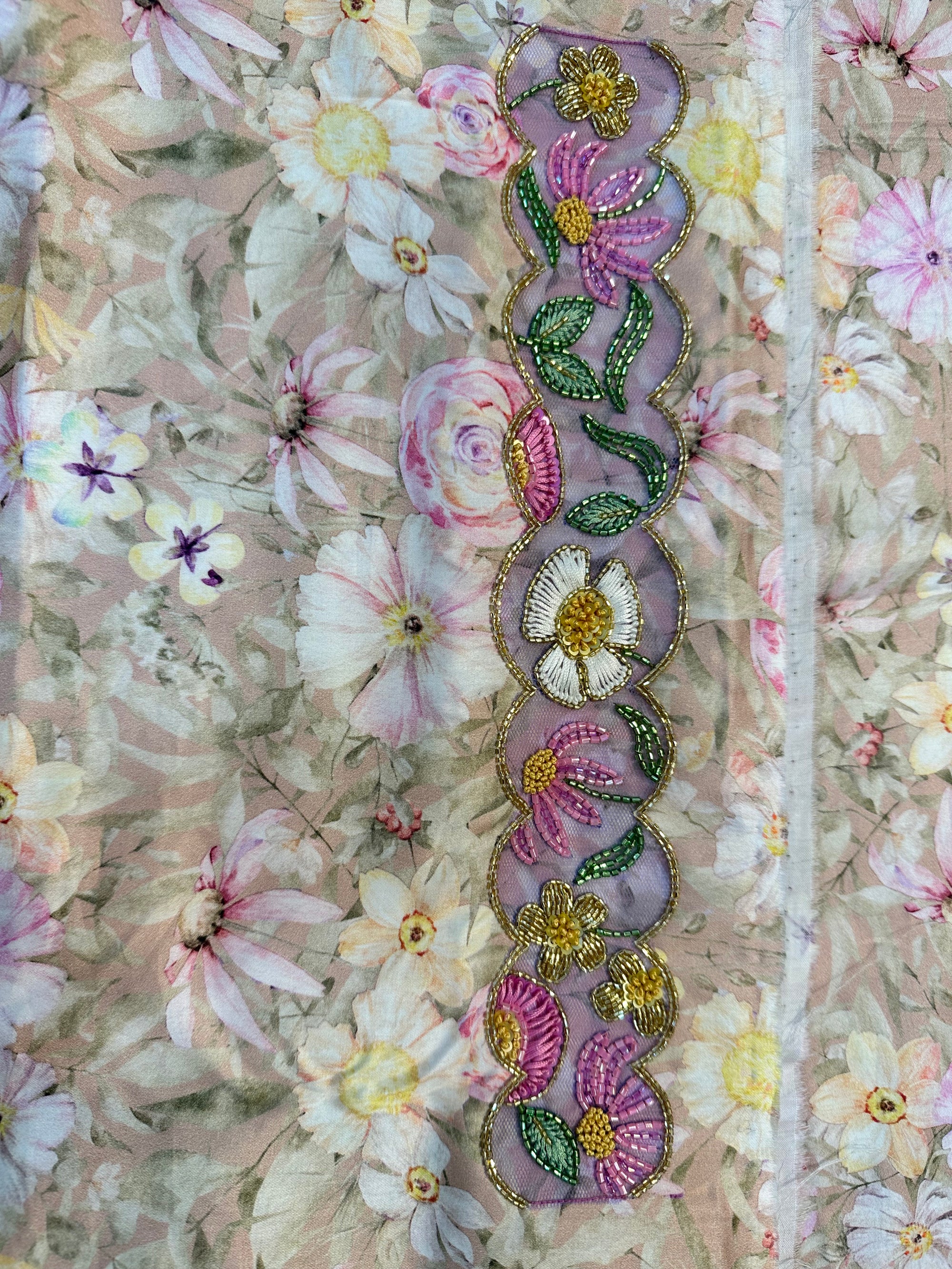 Premium printed cotton fabric displaying the elegant floral pattern of the Ivory Blossom Cotton Mukhawar for custom tailoring by Gharza Couture.
