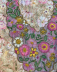 Premium printed cotton fabric displaying the elegant floral pattern of the Ivory Blossom Cotton Mukhawar for custom tailoring by Gharza Couture.