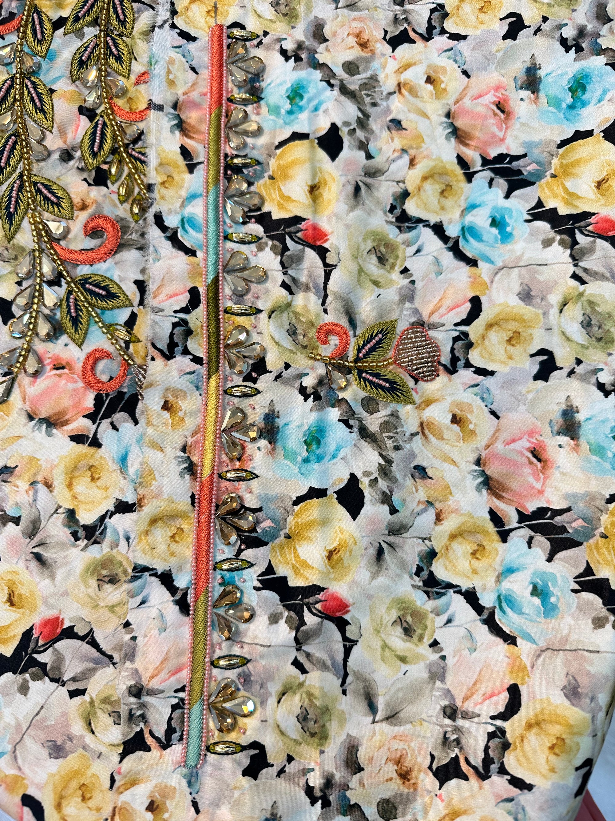 Detailed view of the premium printed cotton fabric on the Ivory Paisley Bloom Cotton Mukhawar featuring elegant floral blooms and paisley motifs by Gharza Couture.