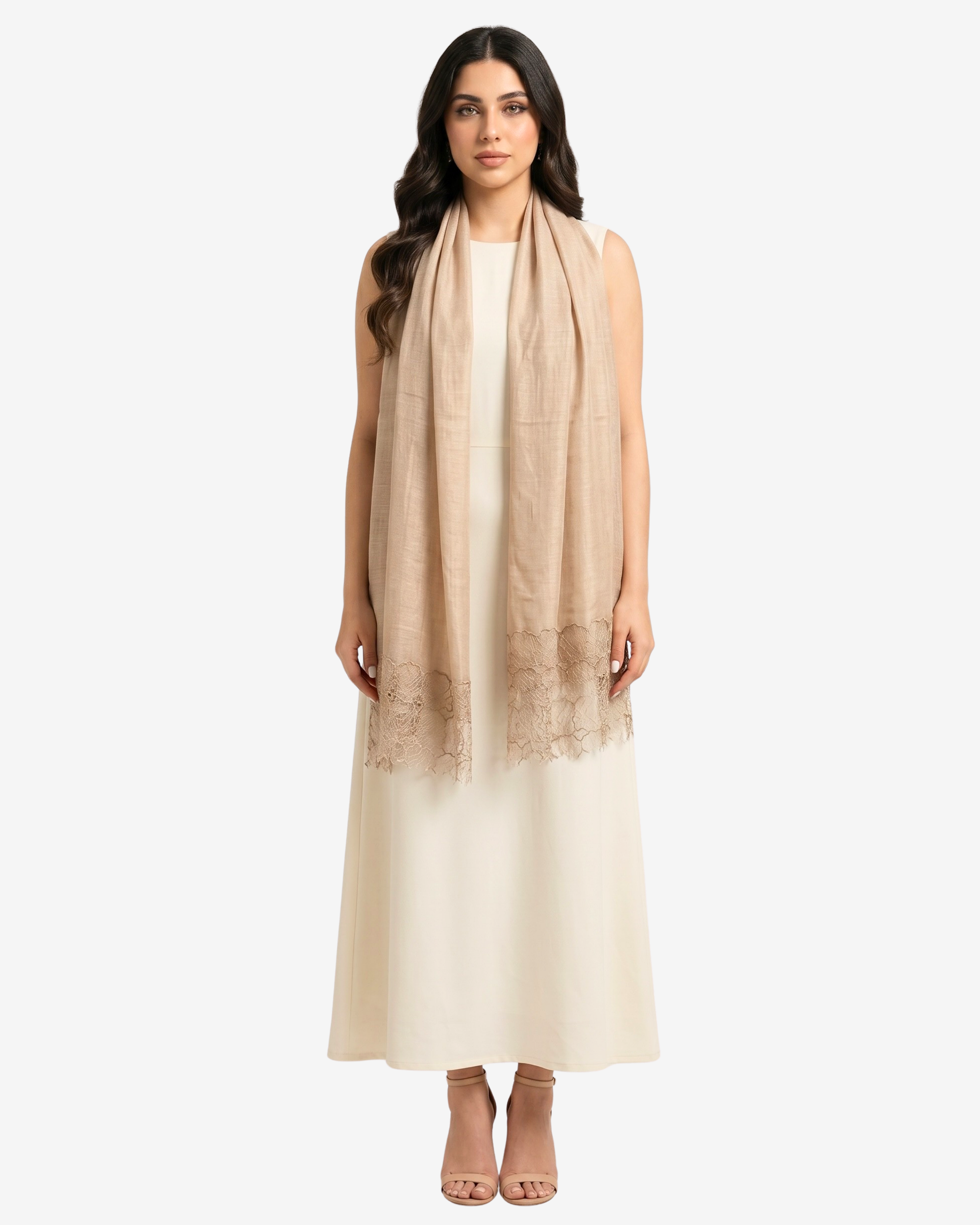 A woman modeling a long, lightweight beige scarf with delicate lace trim at the bottom, draped over a cream-colored sleeveless dress against a light gray background.