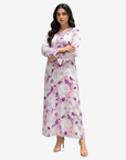Luxury silk Mukhawar with a soft lavender floral print, flowing silhouette, and handcrafted embellishments on the neckline and cuffs.