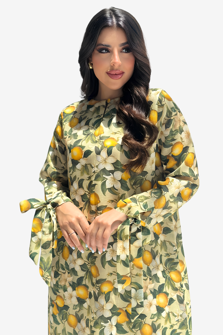 Lemon Blossom Bow Linen Blend Jalabiya close-up showing citrus lemon blossom print and round neckline
