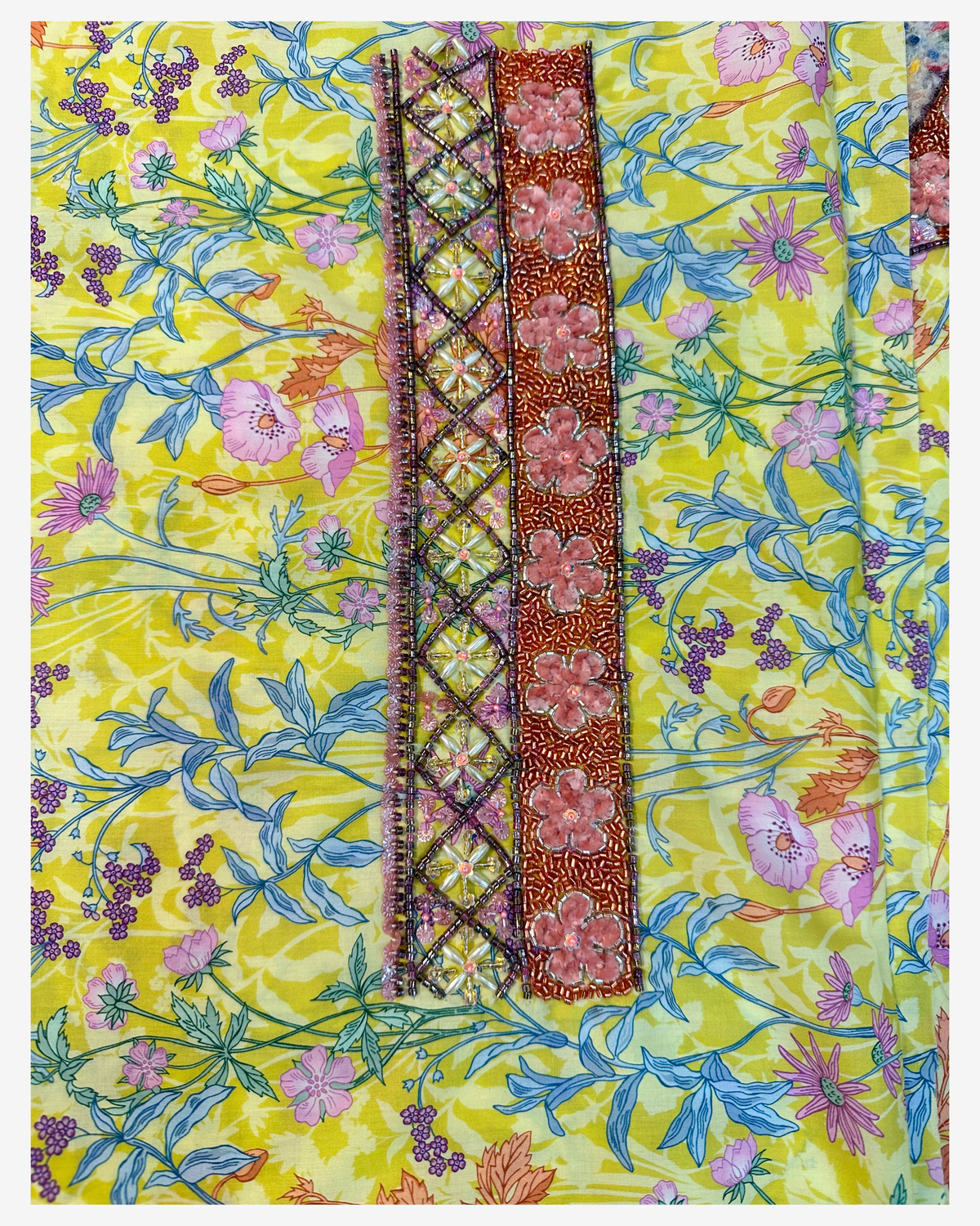 Matching hand design on lime Liberty Kaleidoscope mukhawar fabric with pink floral, copper and geometric beadwork.