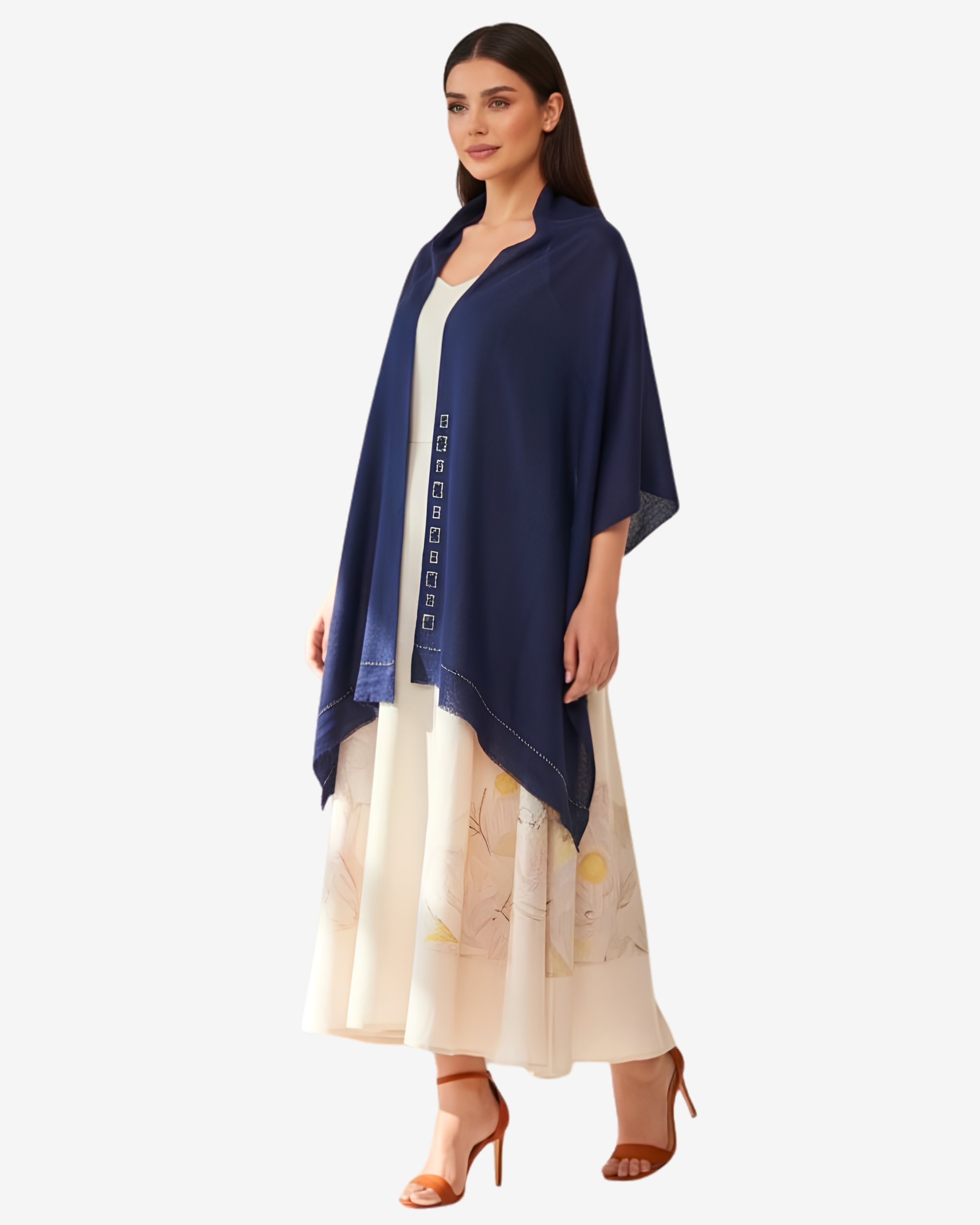 A woman modeling a navy blue shawl draped over a cream-colored printed maxi dress, set against a plain light gray background.