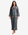 Luxury silk Mukhawar with a sophisticated paisley print, mandarin collar, tassel neckline, and flowing full-length silhouette.