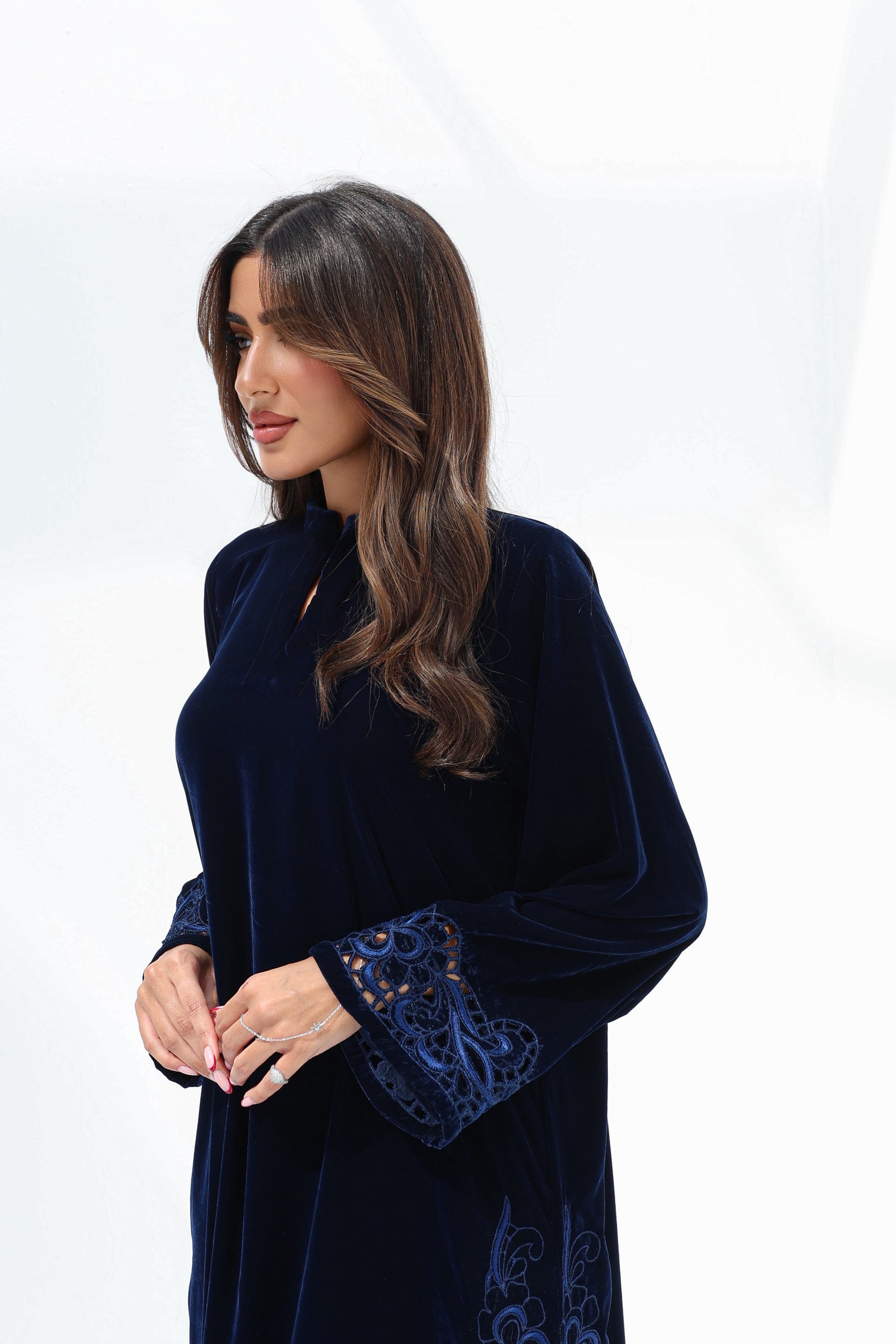 Close three-quarter view of Midnight Velvet Jalabiya highlighting the hand-embroidered sleeve detail