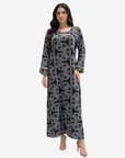 Three-quarter view of Monarch Link black geometric print modest jalabiya