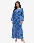 Three-quarter view of Monarch Link royal blue geometric print modest jalabiya