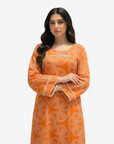 Close-up of Monarch Link pearl trim detail on orange geometric linen blend jalabiya