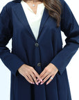 Close-up of Navy Structured Pleated Abaya showing the lapel collar and buttons