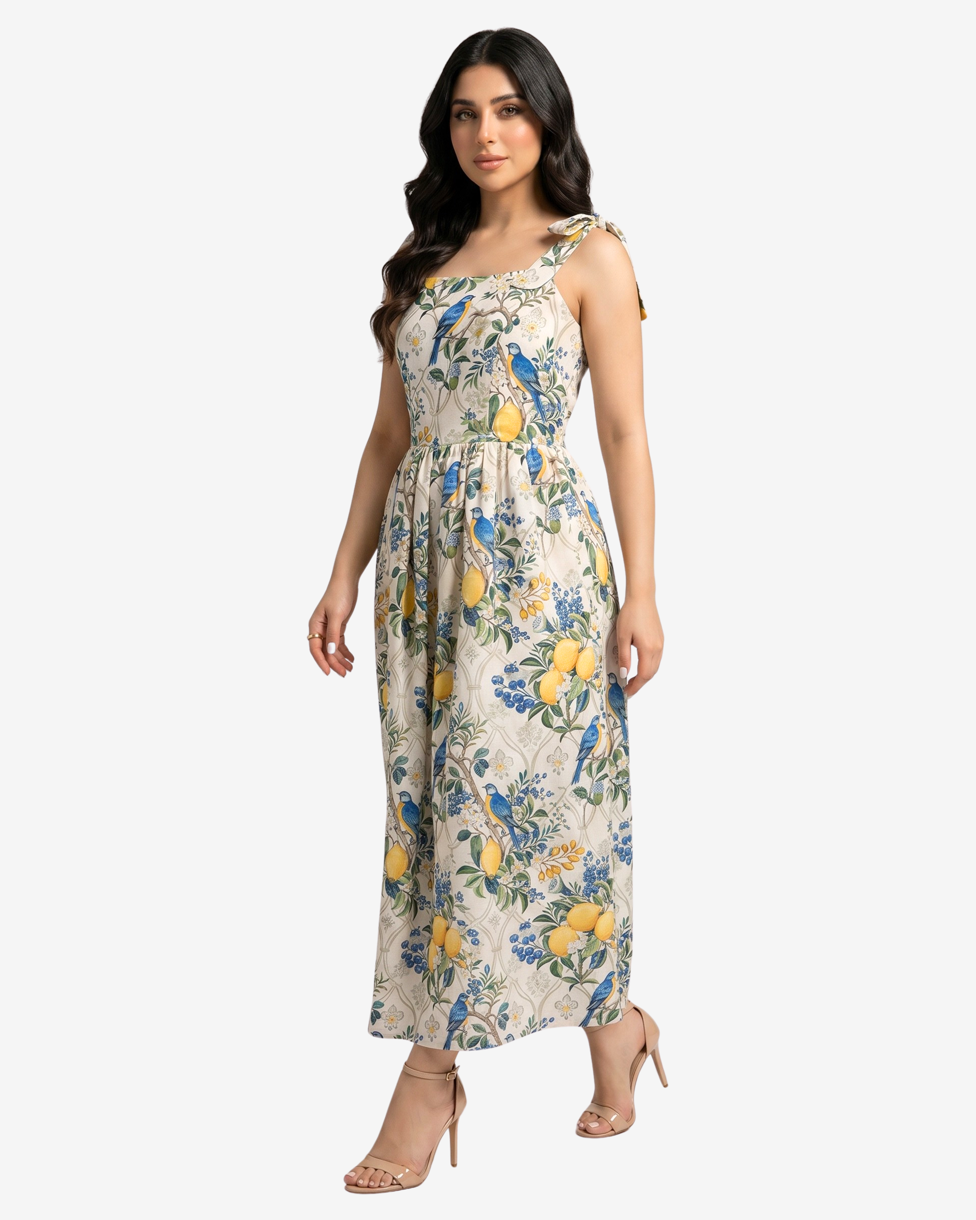 Side view of the Orchard Aviary Linen Blend Maxi Dress highlighting the lightweight drape and vibrant botanical print by Gharza Couture.