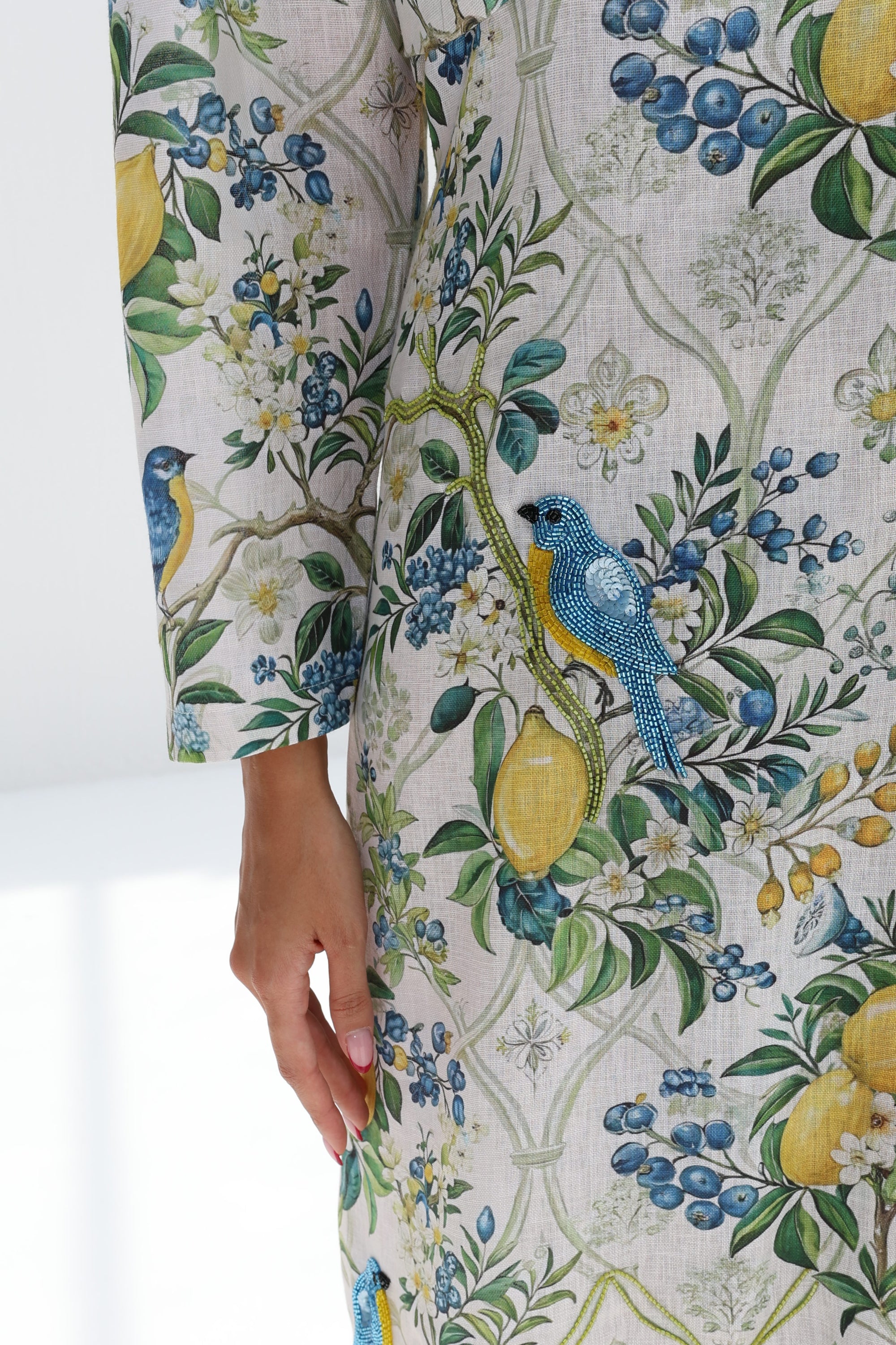 Close-up of Orchard Aviary Linen Blend Dress showing detailed orchard-inspired print