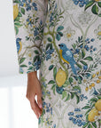 Close-up of Orchard Aviary Linen Blend Dress showing detailed orchard-inspired print