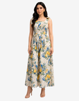 Orchard Aviary Tie Shoulder Linen Blend Dress by Gharza Couture featuring a botanical print with lemons, blue birds, and a flowing sleeveless maxi silhouette.
