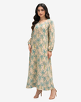 Three-quarter view of the Palm Canopy Hand Embellished Linen Blend Jalabiya highlighting the elegant palm print, handcrafted embellishment, and flowing silhouette.