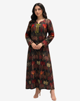 Three-quarter view of Palm Sanctuary modest linen blend jalabiya with tropical palm print and ribbon detail