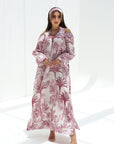 Full-length view of Palm Escape Open Shoulder Linen Blend Jalabiya in burgundy palm print