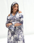 Upper-body view of Palm Escape Open Shoulder Linen Blend Jalabiya in blue palm print