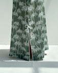 Decorative sleeve tie detail on sage green palm print linen blend jalabiya