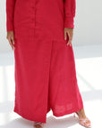 Lower front view of Ruby Essence Linen Blend Co-ord Set highlighting the matching wide-leg trousers and elegant drape.