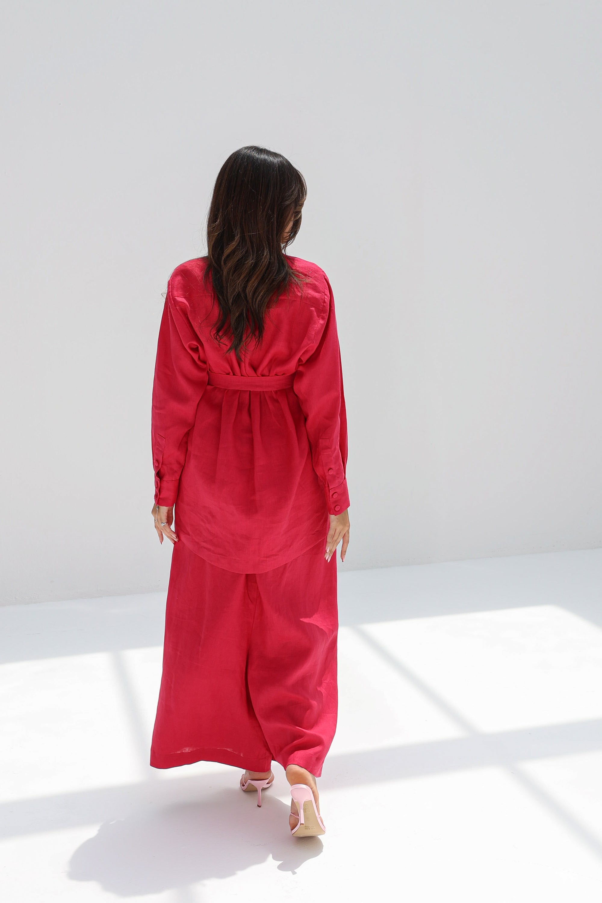 Back view of Ruby Essence Linen Blend Co-ord Set in ruby red featuring a relaxed silhouette and premium linen blend fabric.