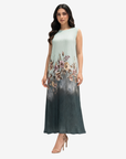 Walking view of the Sage Blossom Velvet Satin Dress highlighting the graceful drape and floral artwork.
