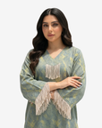 Close-up of the Sage Mirage Fringe Detail Linen Blend Jalabiya highlighting the V-neck tassel embellishment.
