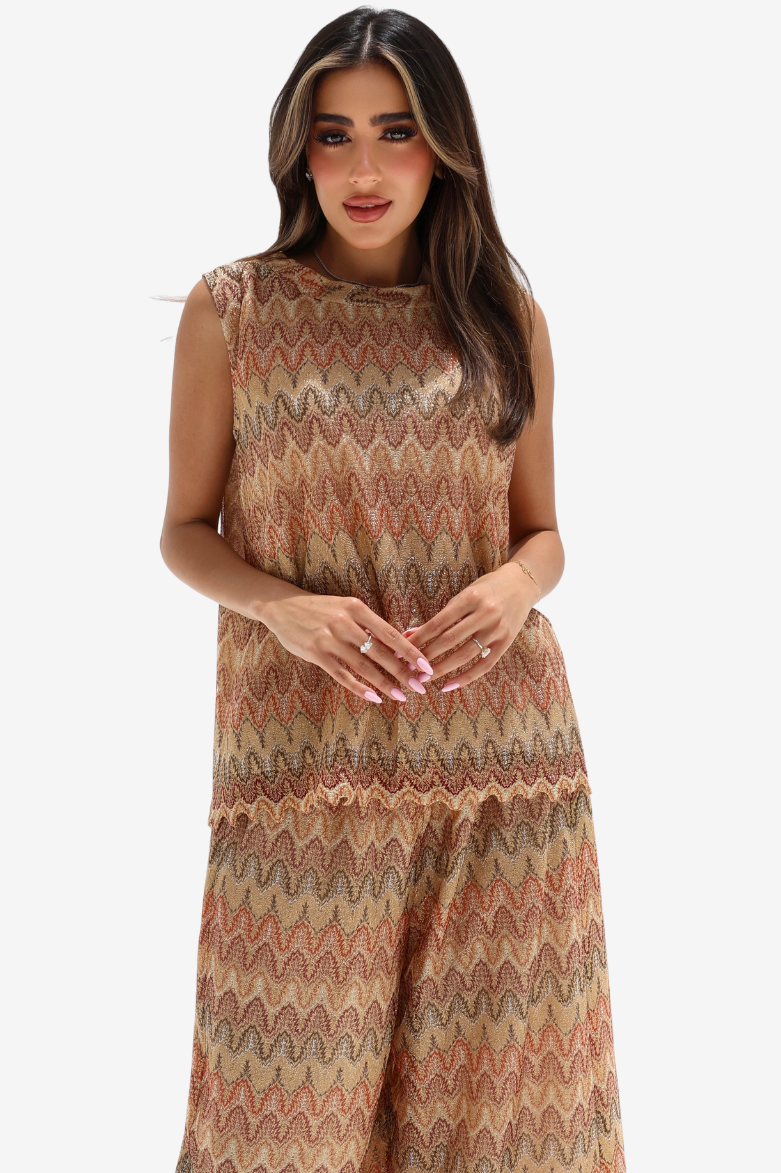 Front view of sand mosaic lace set featuring a sleeveless top and wide-leg trousers