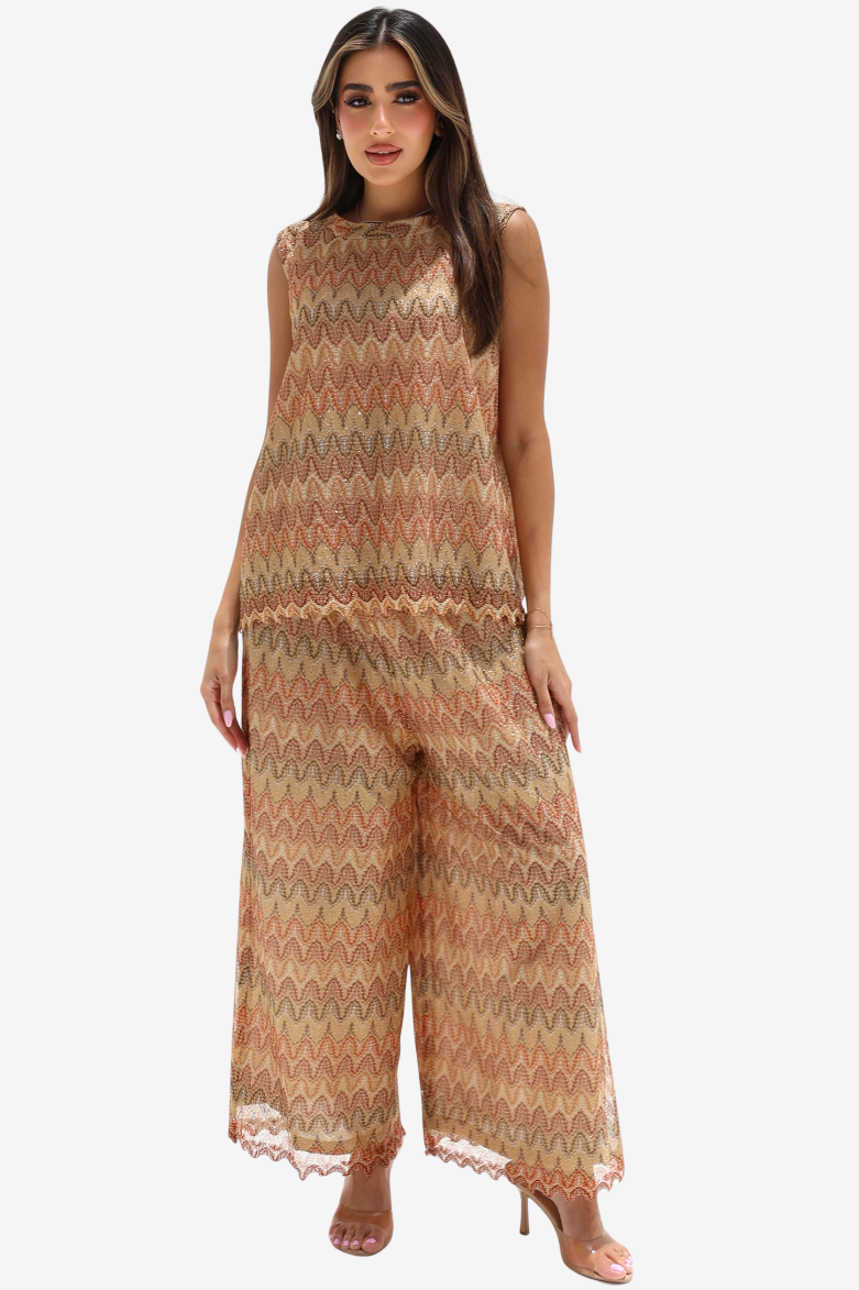  Front view of sleeveless mosaic-patterned top with coordinating wide-leg trousers