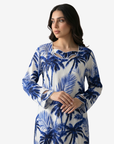 Close-up of Sapphire Palm Cutout Neck Linen Jalabiya highlighting cutout neckline, premium linen fabric and tropical palm print