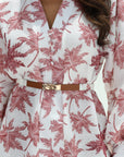 Close-up of white and rose Signature Hand Embellished Dress showing collar and belt detail