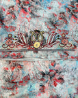 Premium printed cotton fabric displaying the sky watercolor floral pattern of the Sky Watercolor Floral Cotton Mukhawar for custom tailoring by Gharza Couture.